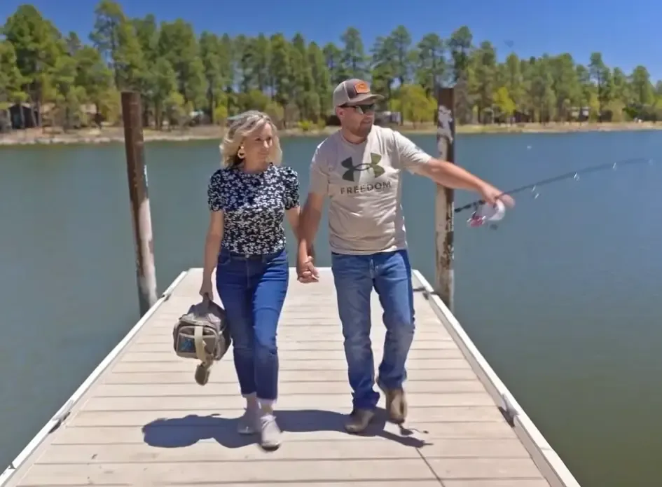 Wes and Keri Reidhead fishing in the White Mountains — the kind of access and lifestyle that brings Phoenix buyers up here